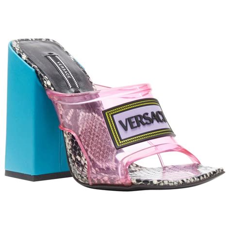 versace blue and pink 90s logo mules|VERSACE.